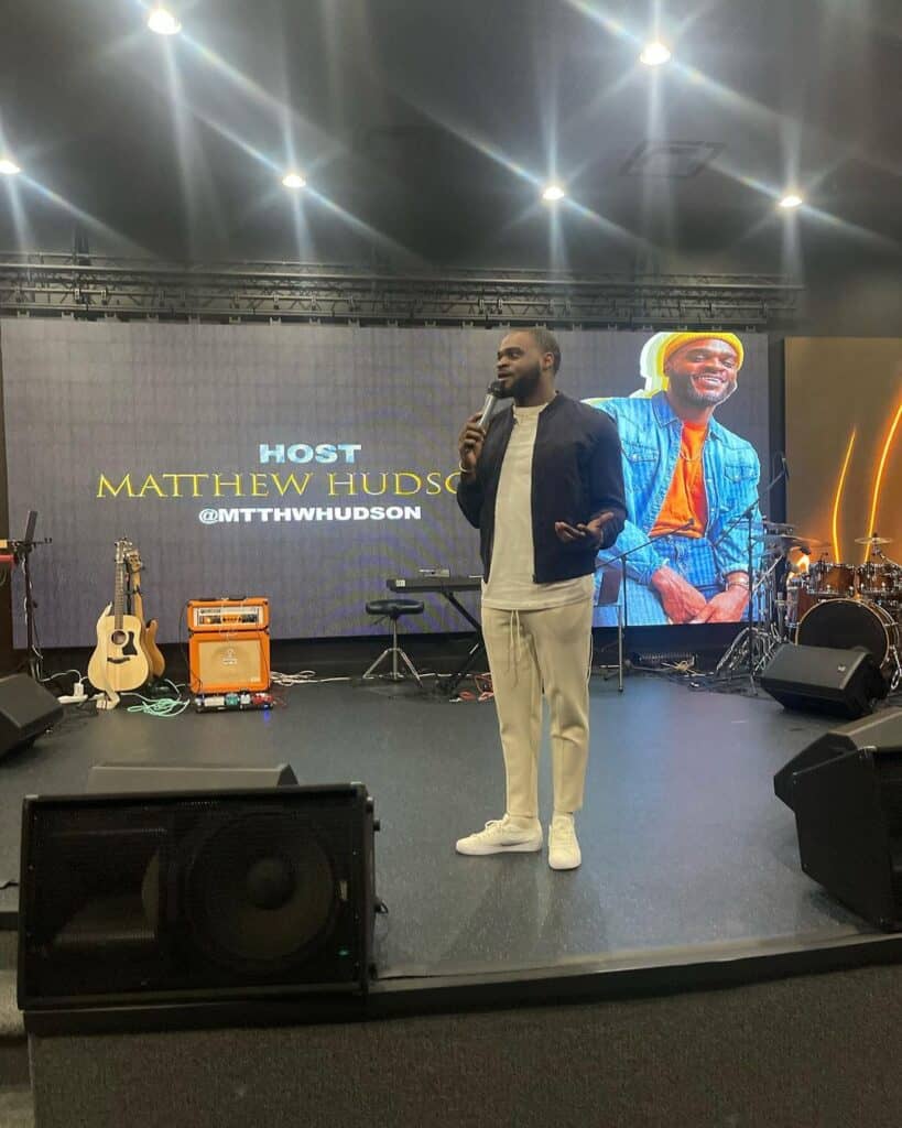 The 116 Life alt pic 1 Matthew Hudson on stage